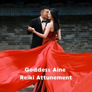 a woman in a red gown dancing closely with a man in a black tuxedo. Represents Goddess Aine for love, intimacy and desire
